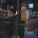 Nezida Davis (right) trains with National African-American Gun Association safety instructor Mitch Mitchell (CBS46)